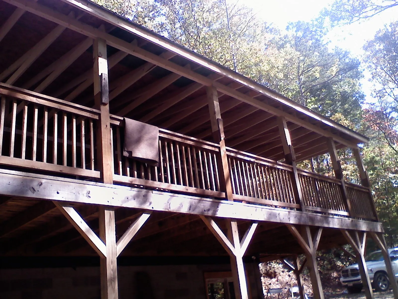 Timber framing under a new elevated porch and deck — Roof Leak Repair in Concrete by Roofing Brothers